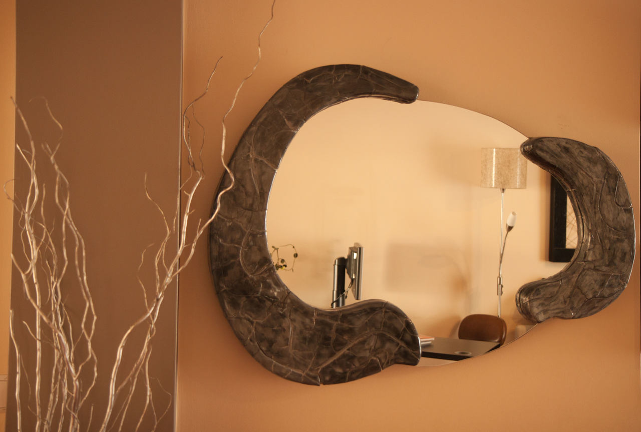 Espelho decorativo em barro